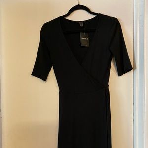 Cute short black dress from forever 21. Never worn, tags still in tact.